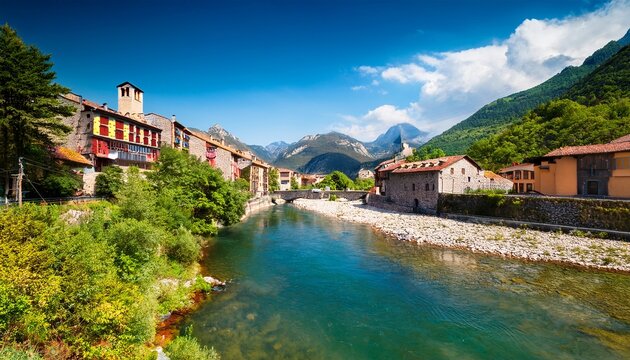 river aragon canal flowing through canfranc village in the pyrenees