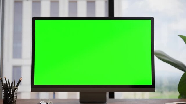Computer PC Monitor Green Screen In Modern Executive High Office - Front View Zoom in