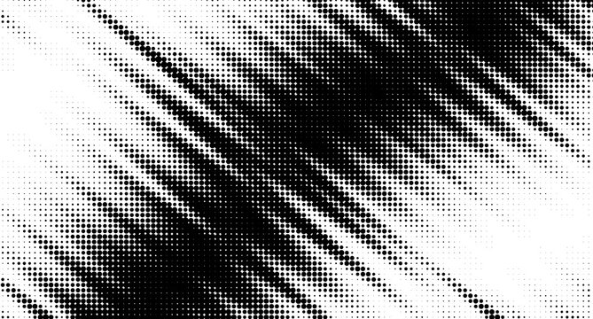 Abstract black halftone dots pattern on grainy white background