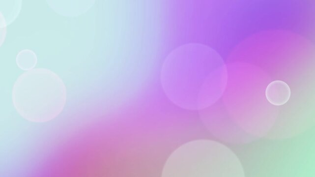 Floating pastel spheres with soft gradients creating a dreamy and abstract bokeh background in shades of purple pink and teal
