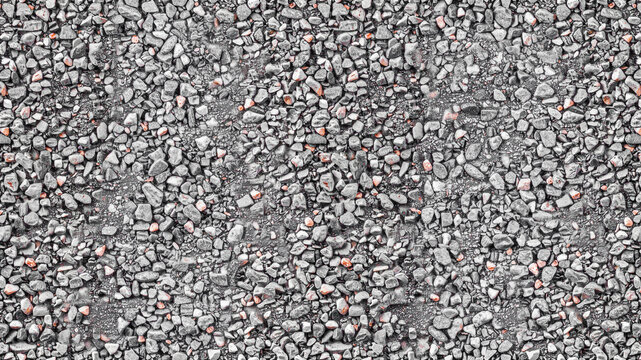 Grey gravel texture background. Top down macro view of small crushed stones and pebbles.
