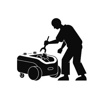Mechanic repairs a portable industrial generator using a large wrench in this black silhouette.