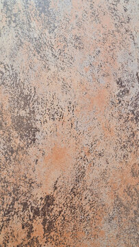 Abstract textured wall in peach and gray tones