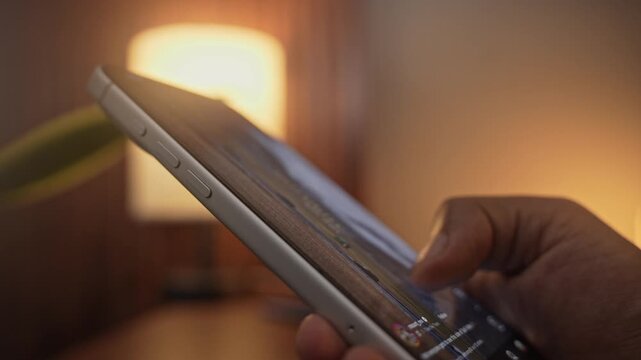 Close-up of scrolling through Instagram Reels, a social media app on a smartphone, depicting digital addiction, mindless browsing, and screen dependency in daily life and prolonged scrolling.
