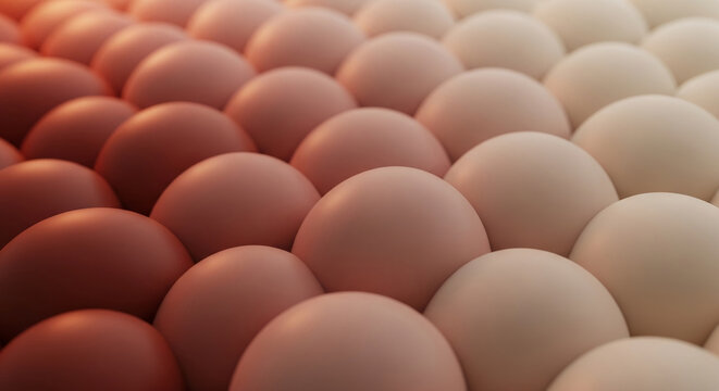 Close-up of rounded eggshell surfaces in warm gradient colors, representing spring, fertility, and new beginnings, ideal for food or natural themes.
