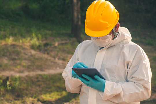 Expert technicians conduct water quality checks and analysis, recording data on tablets.