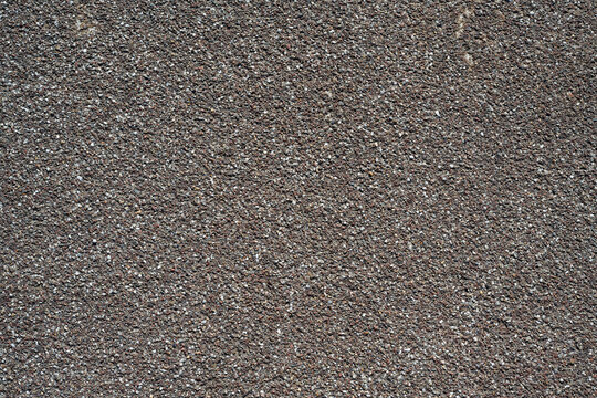 Fine exposed aggregate promenade surface texture background