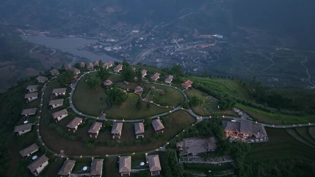 Aerial view of a hillside resort overlooking the scenic valley of Sa Pa, Lao Cai