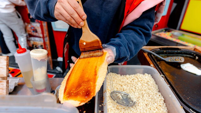 Street vendor preparing traditional Tamasen in Osaka