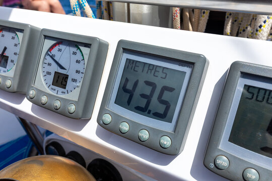 Digital instruments on a sailboat navigating at sea