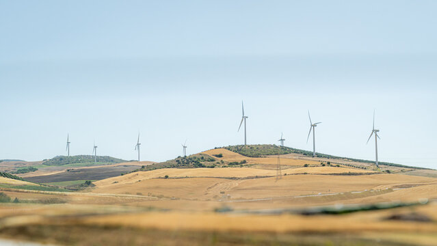 Wind turbines on rolling hills in rural Spain