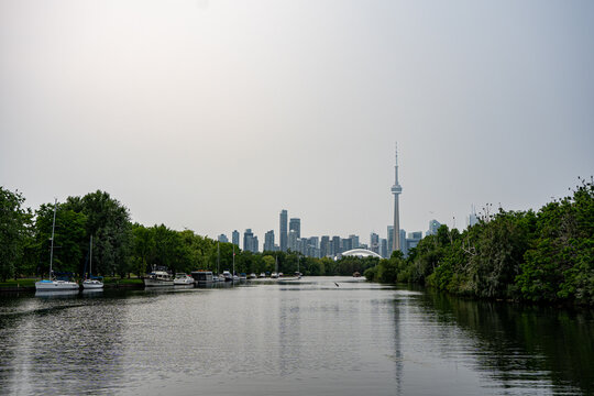 View of Toronto skyline across island waterway.