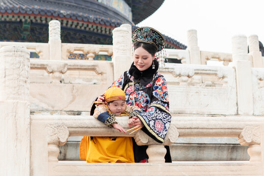 Traditional woman and child at Temple of Heaven, Beijing