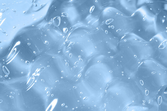 Abstract blue gel texture with bubble smear background