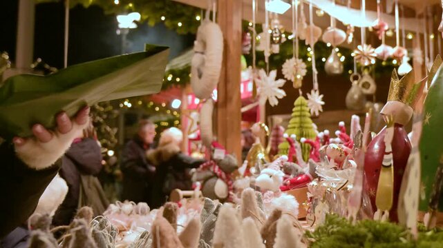 Cash Payment at Christmas Market Stall During Holiday Shopping
