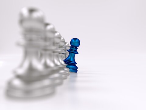 Blue pawn standing out from blurred chess piece line