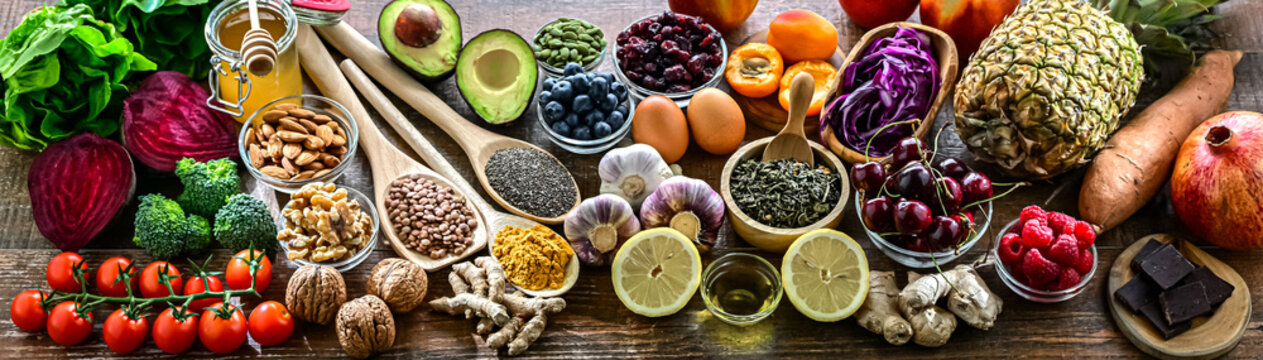Variety of superfood products representing healthy diet.