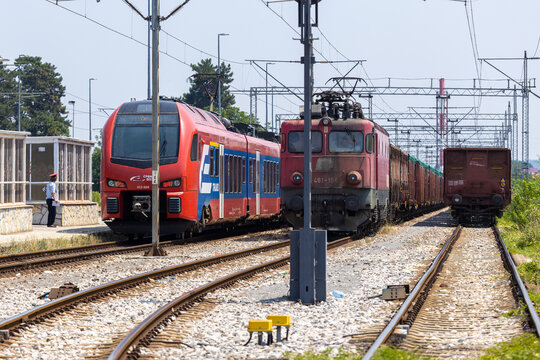 Passenger and freight trains at the railway station in Valjevo, Serbia.
