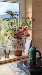 A vase with a bouquet of wildflowers and Viburnum opulus a windowsill © Sergii Mostovyi