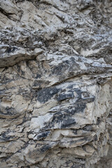 Fototapeta premium Rough Layered Rock Texture and Natural Gray Stone Background