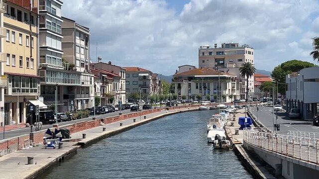 Viareggio city panoramic view of canal with boats, Lucca, Tuscany, Italy. Popular seaside resort and the home of the famous carnival of Viareggio.