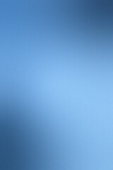 Naklejka premium Vertical deep blue gradient with soft lighting and smooth textured finish.