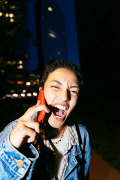 Close-Up of Woman Shouting on Phone