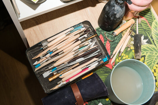 Art Tools and Supplies on a Table in a Creative Workspace