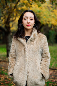 Young woman portrait during autumn season