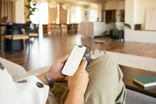 Anonymous woman browsing on smartphone