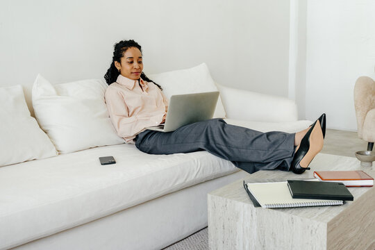 Flexible Remote Work Lifestyle with Business Professional Using Laptop