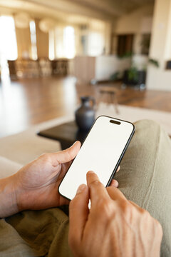 Anonymous woman browsing on smartphone