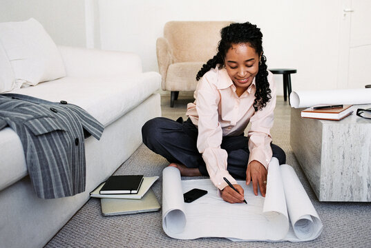 Creative Professional Reviewing and Marking Architectural Plans 