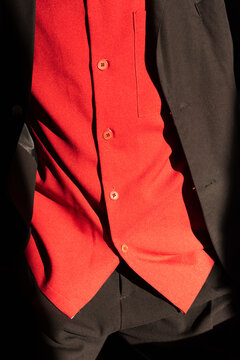 Close up of fashion model in Red Shirt and Black Suit