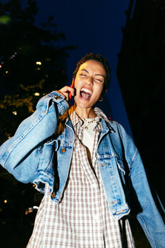 Woman Shouting on Phone