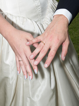 Newlyweds Displaying Wedding Bands