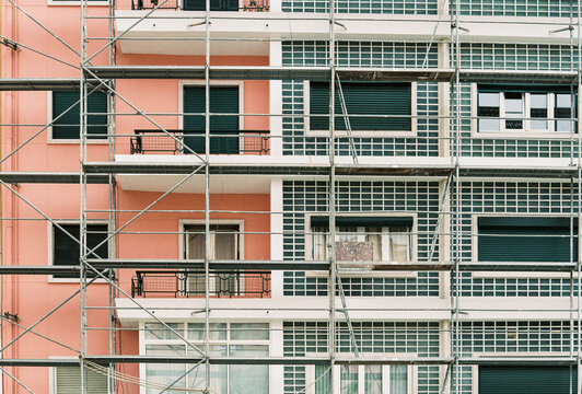 Apartment Building Covered in Renovation Scaffolding