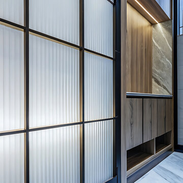 Fluted glass panels and wooden cabinetry in a modern interior setting architectural detail clean design contemporary interior corporate office