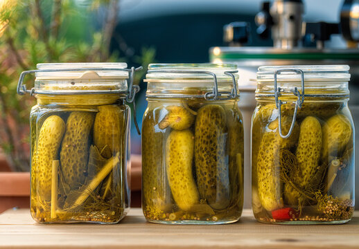 Homemade pickled cucumbers with spices. Rustic-style presentation. Homemade food.