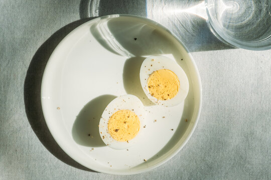 Hard Boiled Egg and Cup of Water