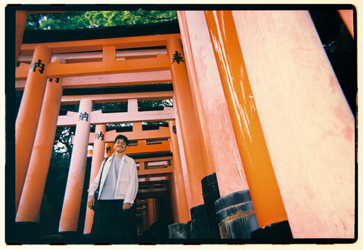 Man Among Fushimi Inari Gates