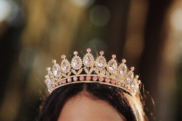 A queen's crown on a beautiful young woman. © Marco