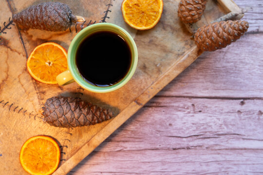 Aromatic coffee with citrus and natural elements