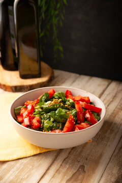 Spinach salad. Fresh and healthy green leaves ready to eat, an easy and nutritious recipe.