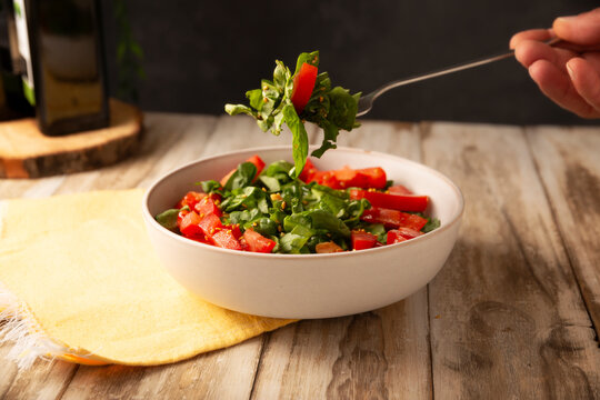 Spinach salad. Fresh and healthy green leaves ready to eat, an easy and nutritious recipe.