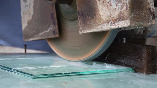 Diamond blade cutting thick glass with precision