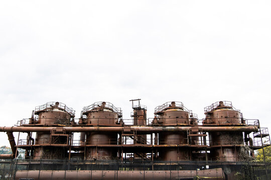Weathered industrial machinery at Gas Works Park under a cloudy sky, Seattle