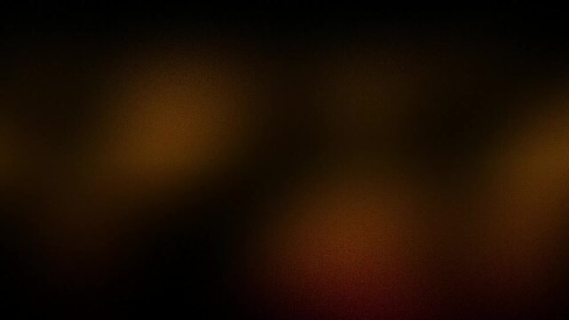 Abstract warm amber gradient background with soft blurred light. Smooth cinematic motion texture featuring golden defocused glow for elegant looping overlays, luxury visuals and creative backgrounds