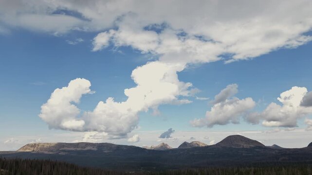 Breathtaking Time-lapsed Mountain Views Under Dramatic Cloudy Sky