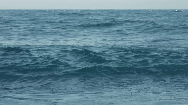 Powerful waves crashing onto a sandy beach
